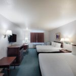 Comfortable ADA Compliant guest room with 2 Queen Beds. Non-Smoking. Max occupancy: 5